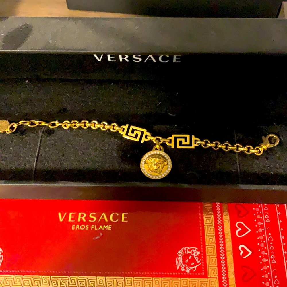Versace gold link bracelet medusa pendent